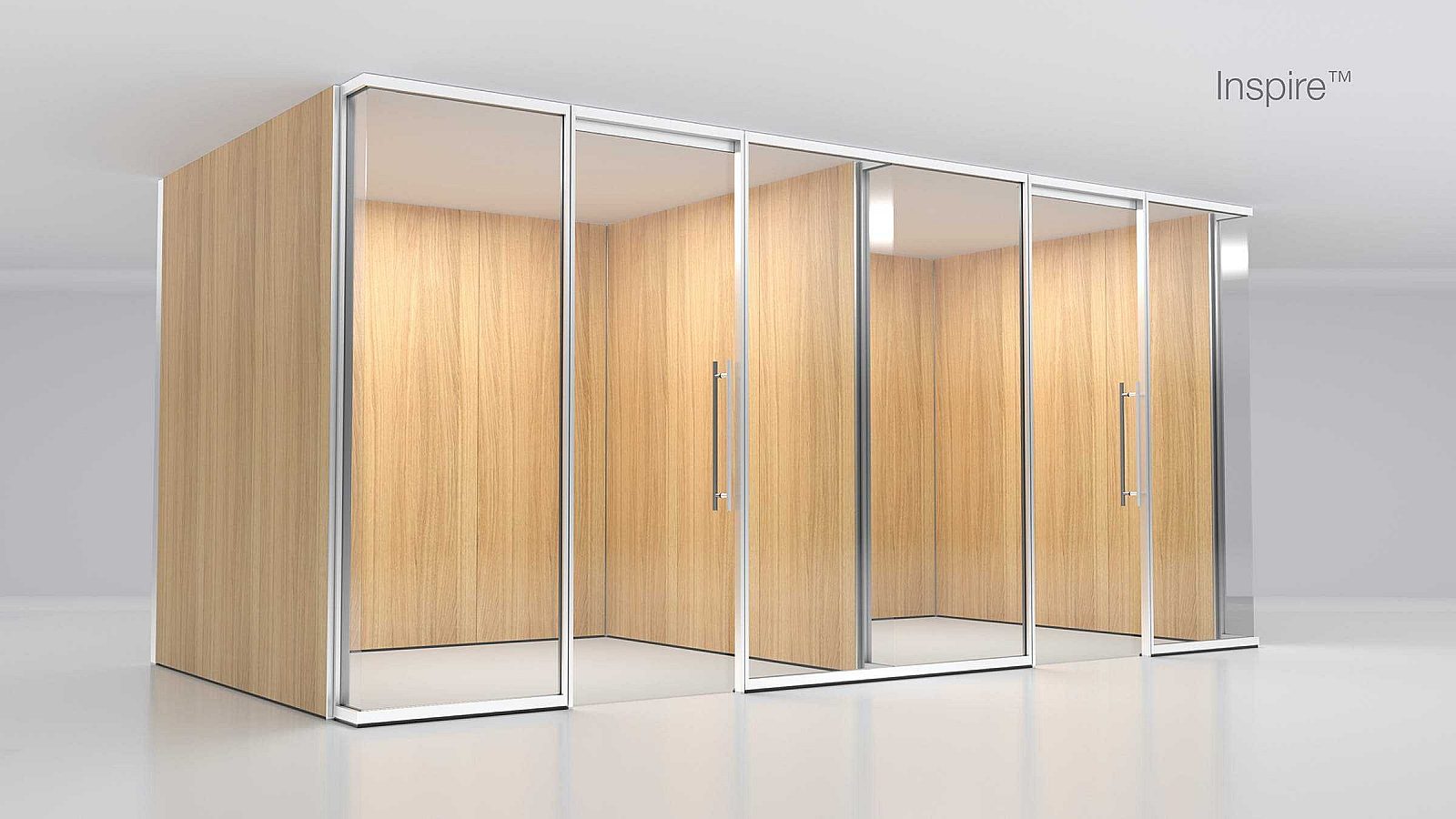 2 empty offices with glass fronts and light wood surrounds.