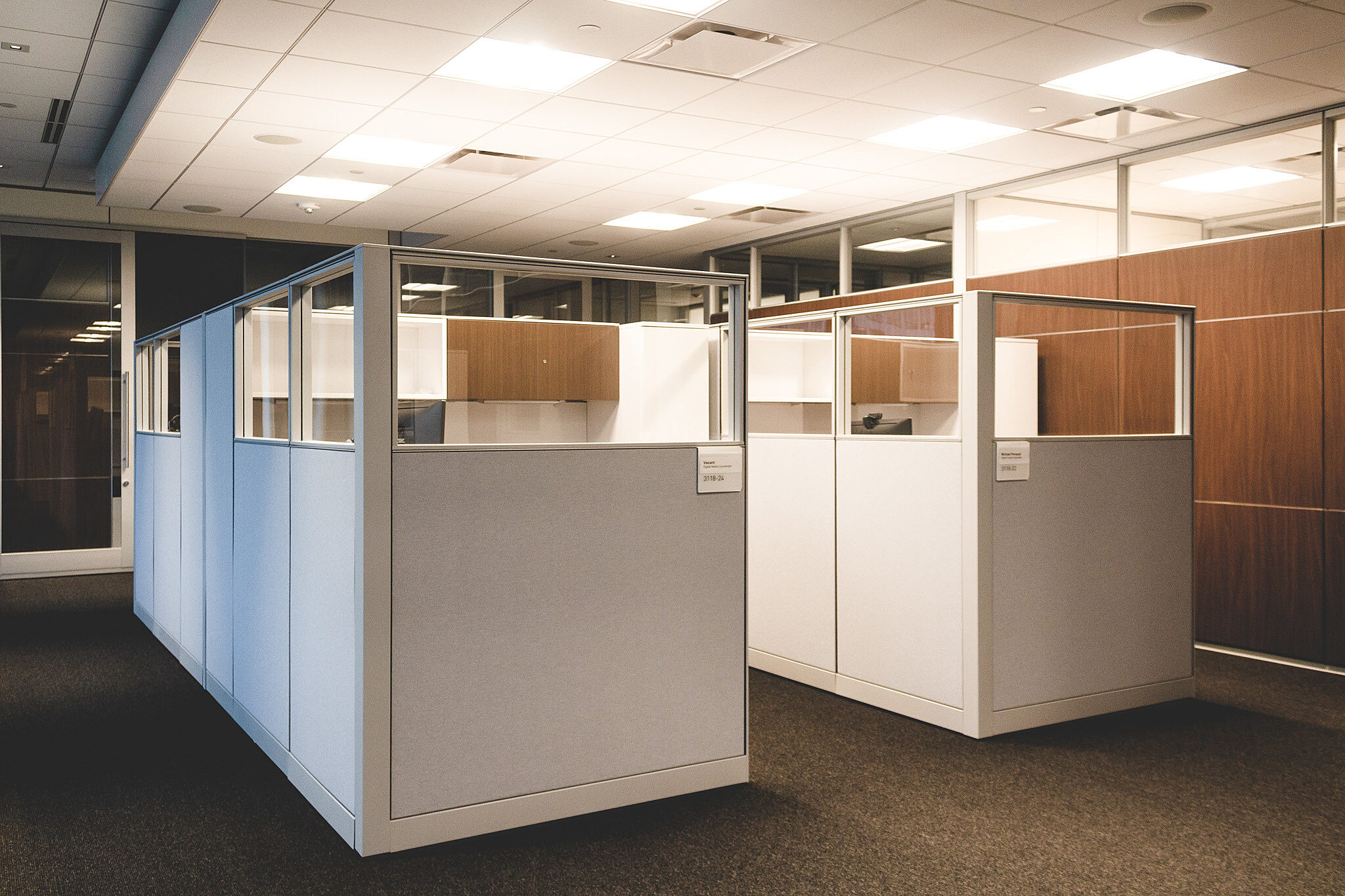 A cluster of workstations with panels separating them